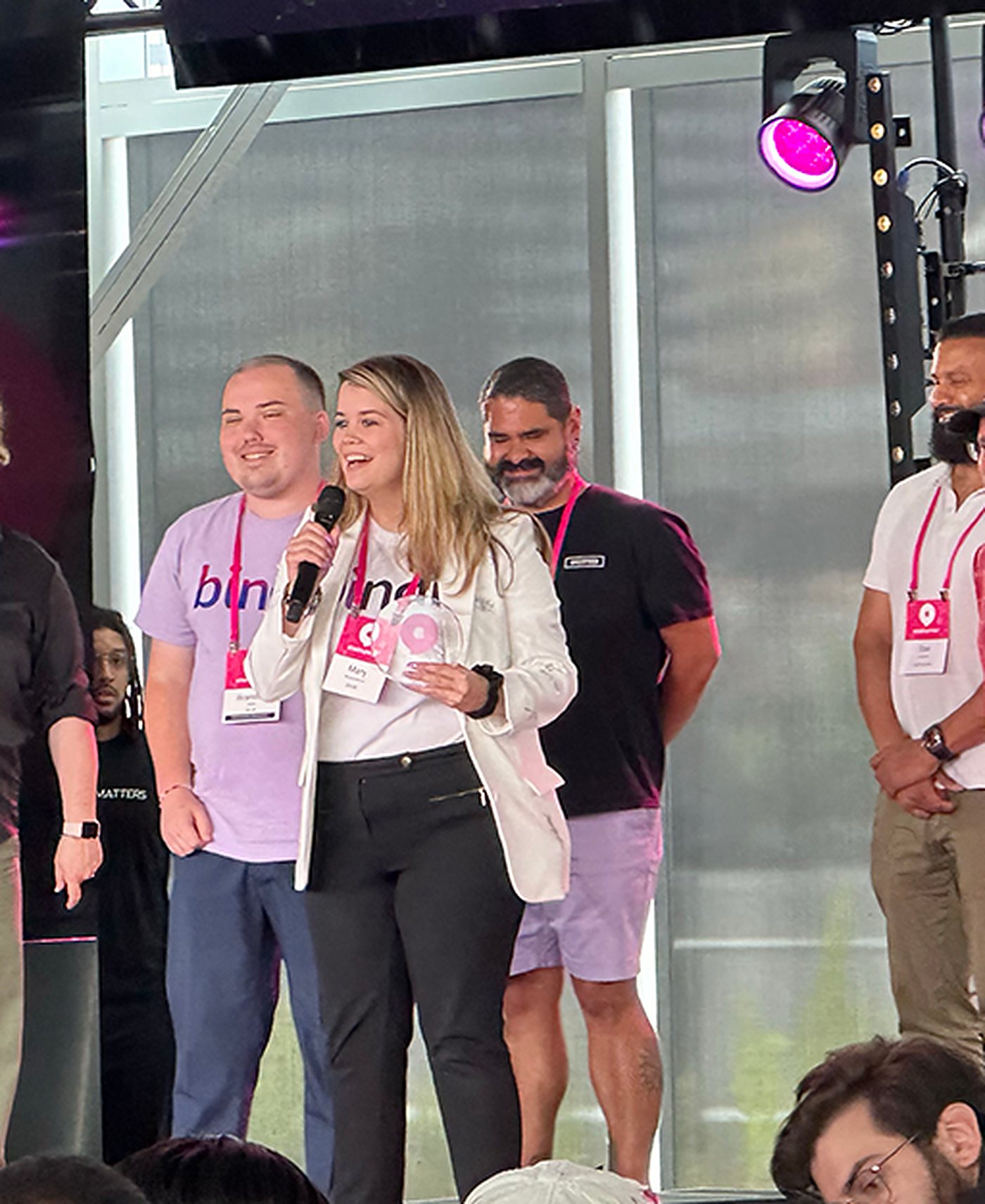 Brandon Teller and Mary Richardson on stage at Startupfest as Bindr is announced 2SLGBTQIA+ prize winner