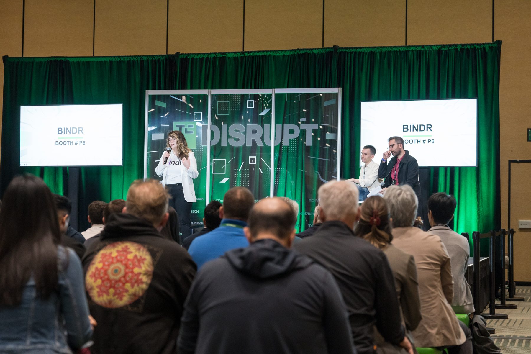 Bindr presenting on the TechCrunch Disrupt stage